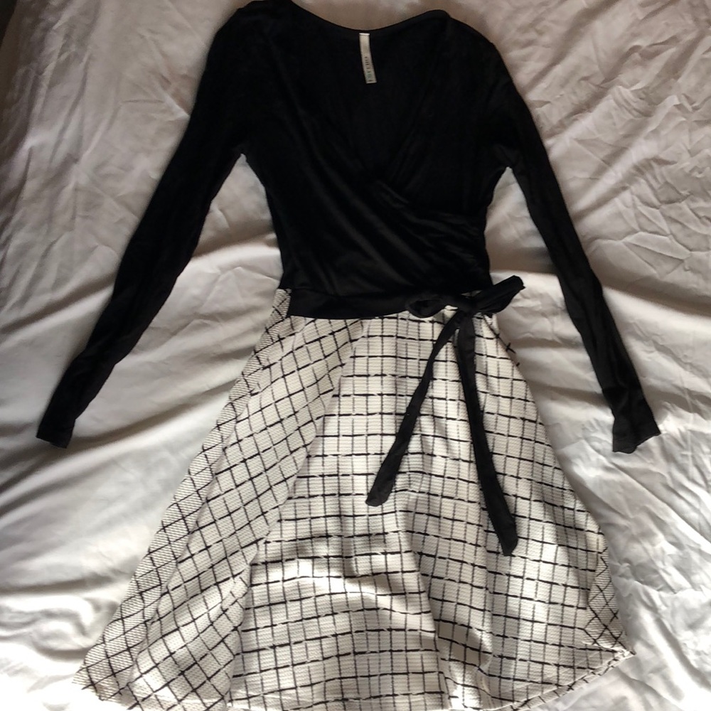 Never been worn!  Black and white dress